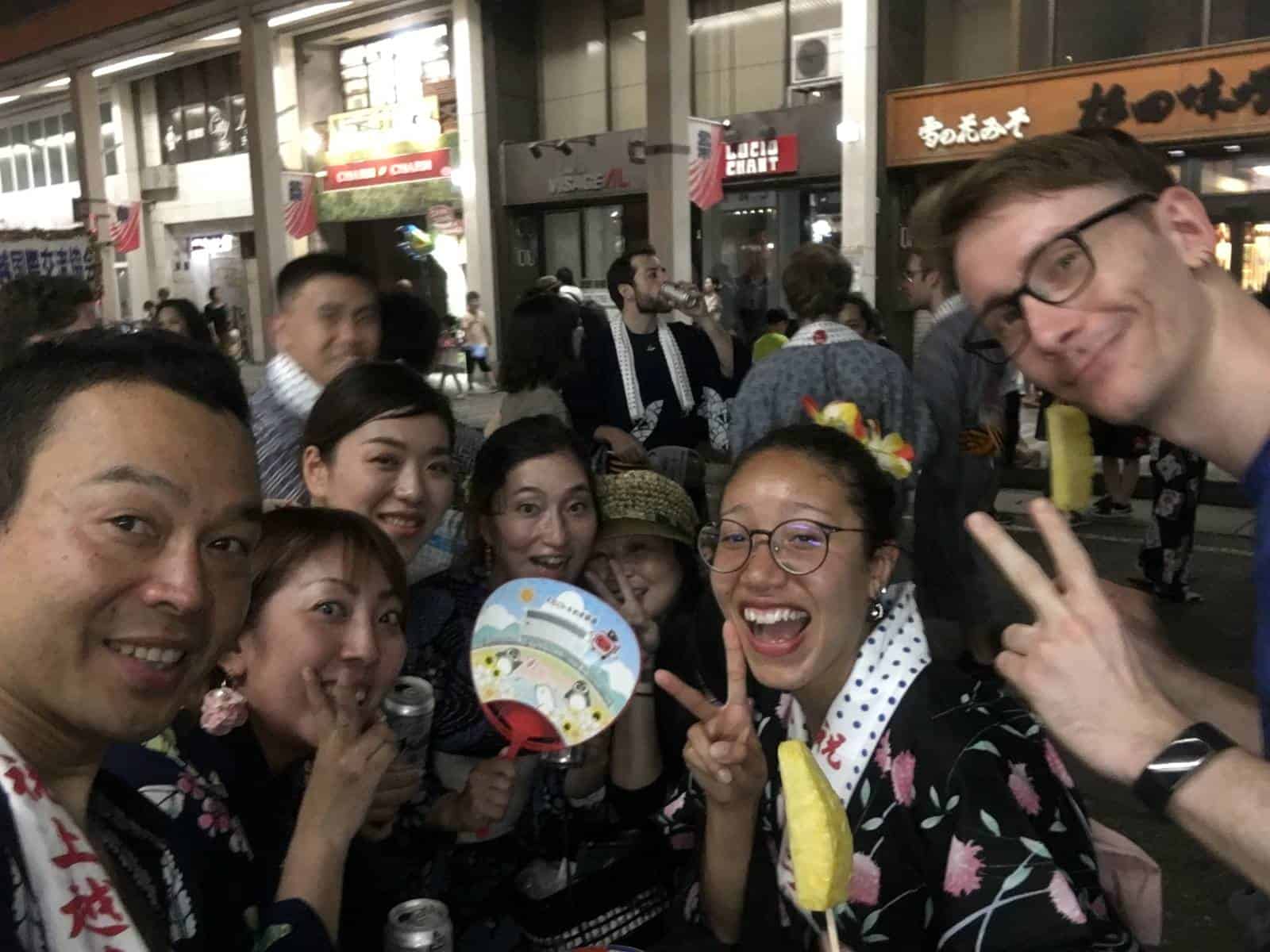 Tour group exploring the town at night